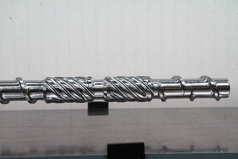 Close-up of double UCC mixing screw. This type of mixer is used for improved dispersionary mixing.