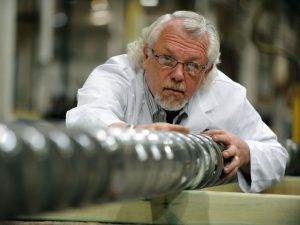 Tim Womer Examining a Screw